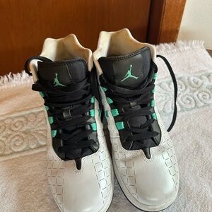 Jordan Big Kids White and Black Sneakers with Green Accents